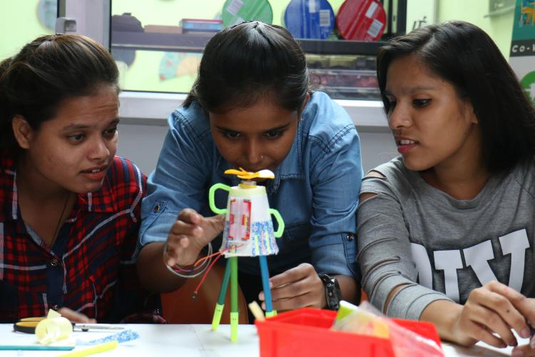 Girls making a project in Makers Space